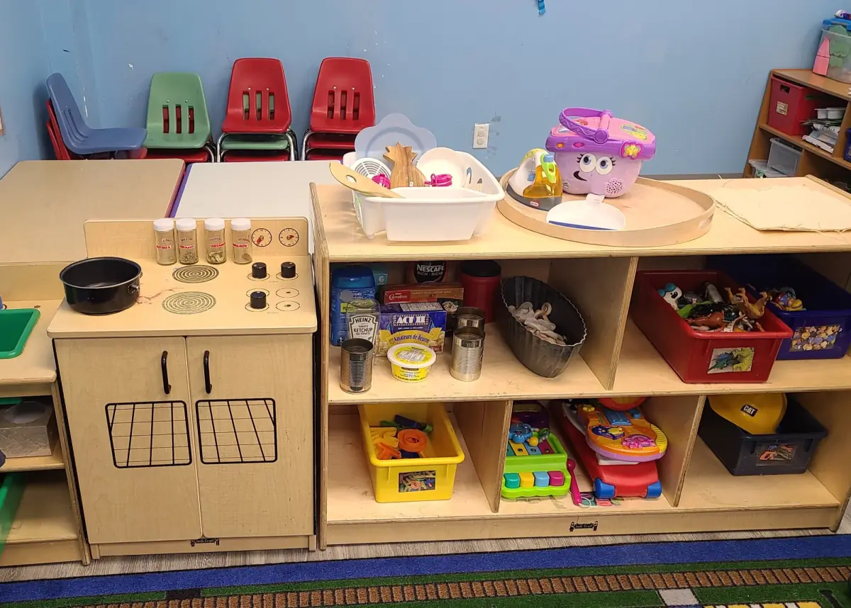 Village Scholars Preschool photo: dramatic play shelves ready for children